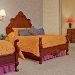 Rushmore Express - Located at the base of Mt. Rushmore. Hickory log furniture, pillow-top beds, in-room microwave & refrigerator, & walking distance to all of Keystone's shopping & restaurants!